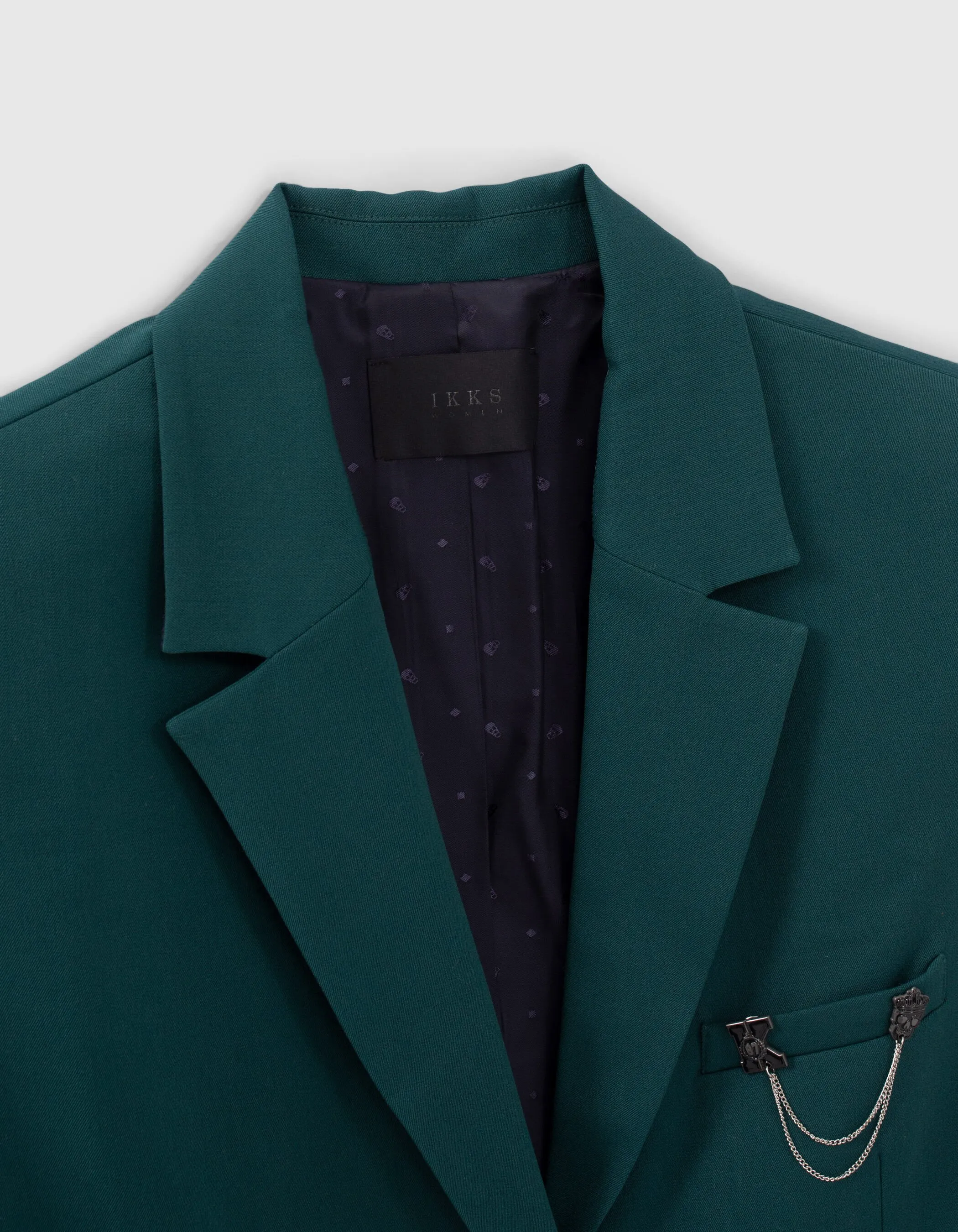 Veste de costume vert canard avec pin's Femme